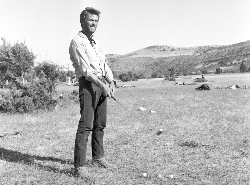 American actor Clint Eastwood playing golf during a break on the set of the film The Good, the Bad and the Ugly. 1966 (Photo by Reporters Associati & Archivi/Mondadori Portfolio via Getty Images)