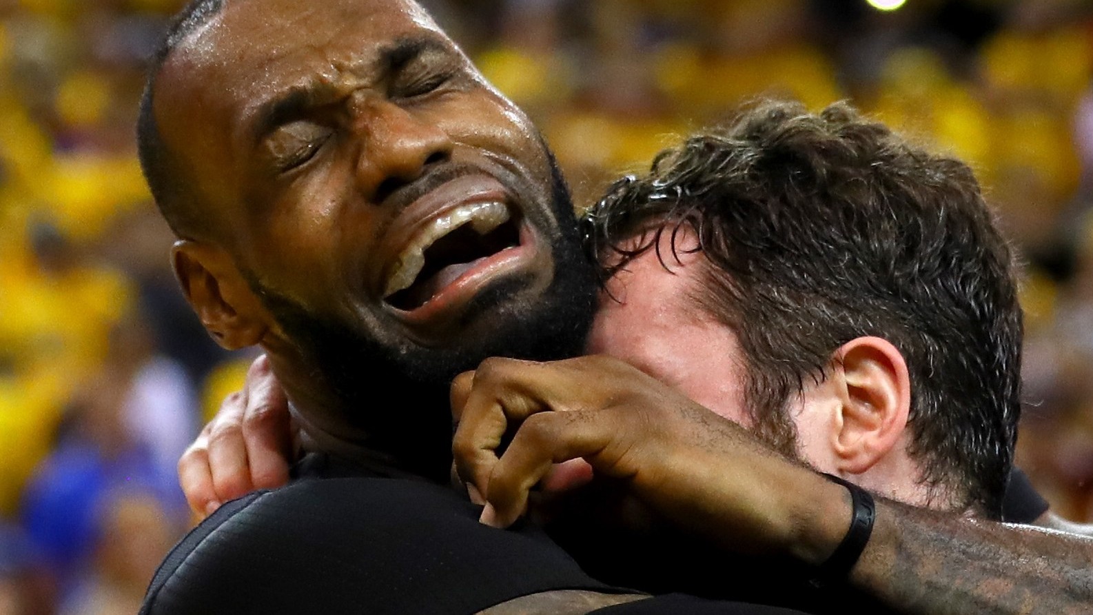 OAKLAND, CA - JUNE 19:  LeBron James #23 and Kevin Love #0 of the Cleveland Cavaliers celebrate after defeating the Golden State Warriors 93-89 in Game 7 of the 2016 NBA Finals at ORACLE Arena on June 19, 2016 in Oakland, California. NOTE TO USER: User expressly acknowledges and agrees that, by downloading and or using this photograph, User is consenting to the terms and conditions of the Getty Images License Agreement.  (Photo by Ezra Shaw/Getty Images)