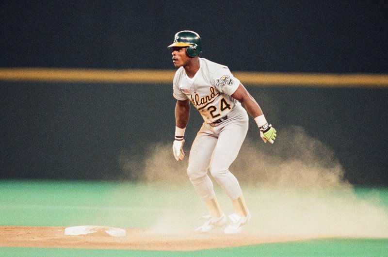 CINCINNATI, OH - 1990: Rickey Henderson of the Oakland Athletics runs the bases during the 1990 World Series against the Cincinnati Reds at Riverfront Stadium in Cincinnati, Ohio. (Photo by Sporting News via Getty Images)