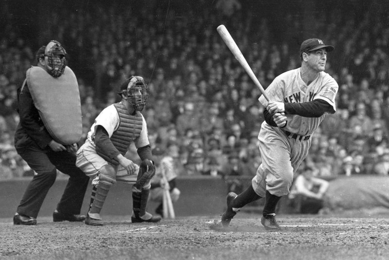 CHICAGO - 1938. Lou Gehrig whacks a double into left center in a game at Yankee Stadium in 1938. Luke Sewell is the catcher for the opponent White Sox. (Photo by Mark Rucker/Transcendental Graphics, Getty Images)