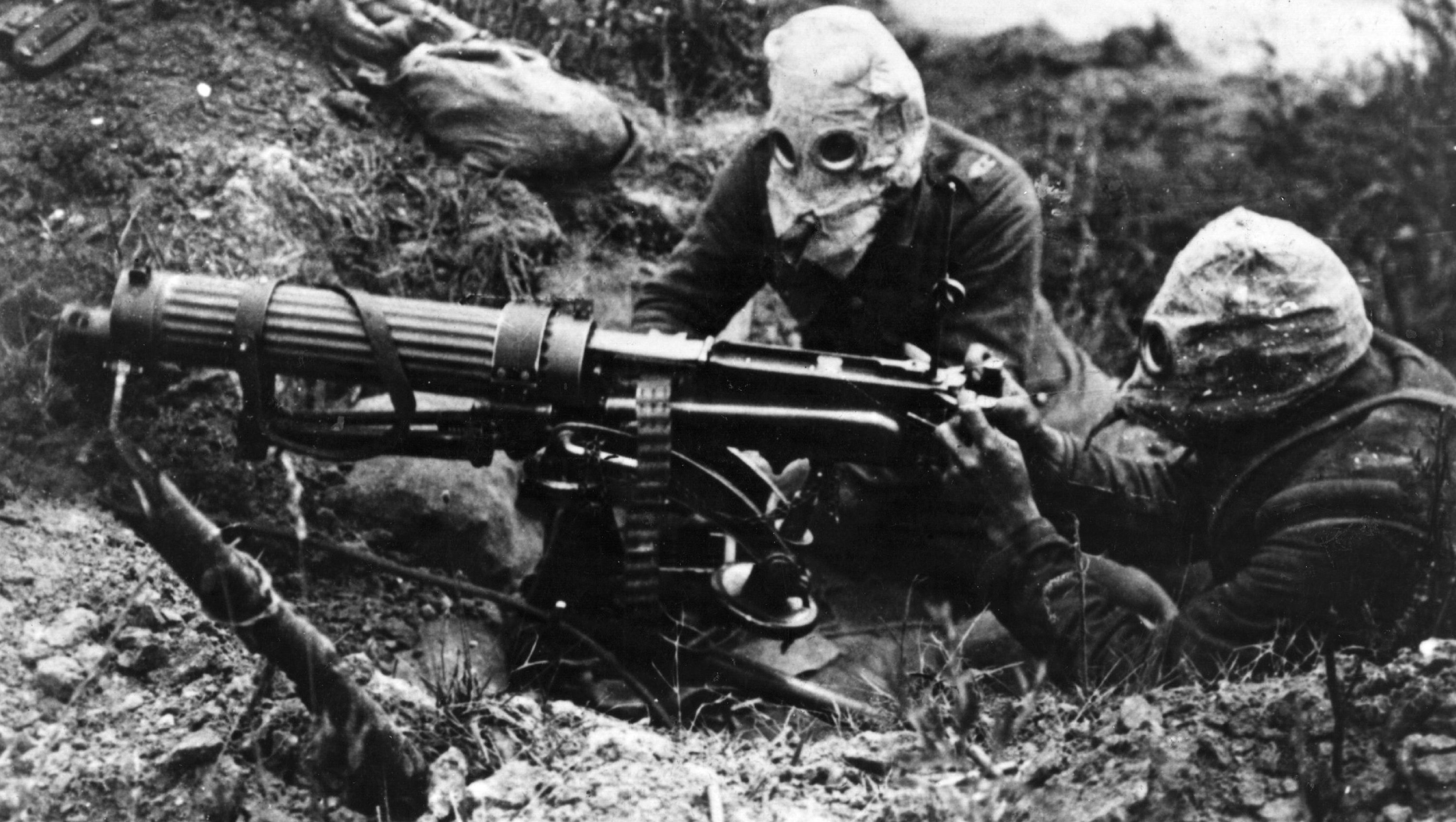 Gas-masked men of the British Machine Gun Corps with a Vickers machine gun during the first battle of the Somme. (General Photographic Agency/Getty Images)