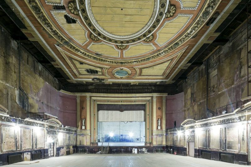 LONDON, ENGLAND - MAY 16: View of the Alexandra Palace Theatre auditorium looking towards the stage on May 16, 2014 in London, England. Alexandra Palace situated in the London Borough of Haringey First opened as 'The People's Palace' in 1873. Just 16 days later a fire broke out in the Palace, burning it down in its entirety. On 2 November the world's first regular high-definition public television broadcast took place from the BBC studios at Alexandra Palace. In 1980 fire again burned a large part of the building, the Palace reopened in 1988. Recently awarded a Round 1 pass from The Heritage Lottery Fund the Palace plans to renovate parts of the derelict building including the BBC Studios and Victorian Theatre. (Photo by Miles Willis/Getty Images)