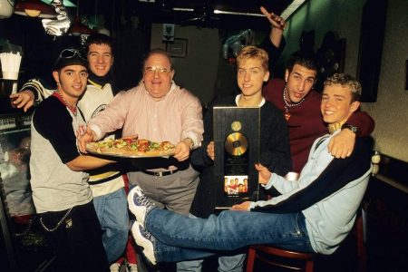 MIAMI - JUNE 06:    Lou Pearlman poses with N'Sync Chris Kirkpatrick,  JC Chasez,  Lance Bass,, Joey Fatone and Justin Timberlake seen at N.Y.P.D. pizza in Miami, circa 1996. (Photo by Mark Weiss/WireImage)