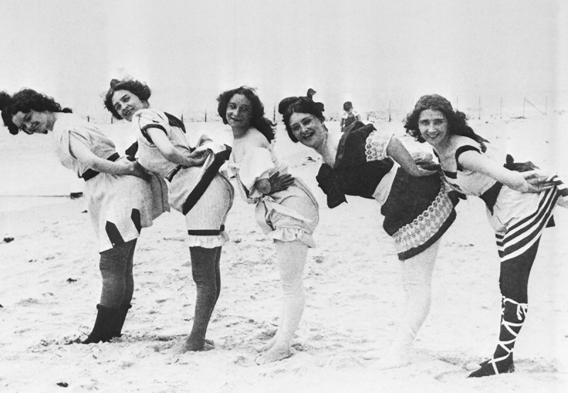 (Original Caption) Bathing beauties in coy pose, at Coney Island, 1897. Stereoscopic view by Stroyhmeyer and Wynn.