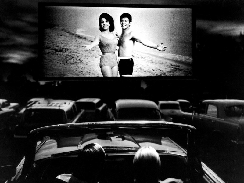 (L-R) Actors Annette Funicello and Frankie Avalon in scene fr. film Beach Blanket Bingo, shown at drive-in movie theater. (Photo by Henry Groskinsky/The LIFE Picture Collection/Getty Images)