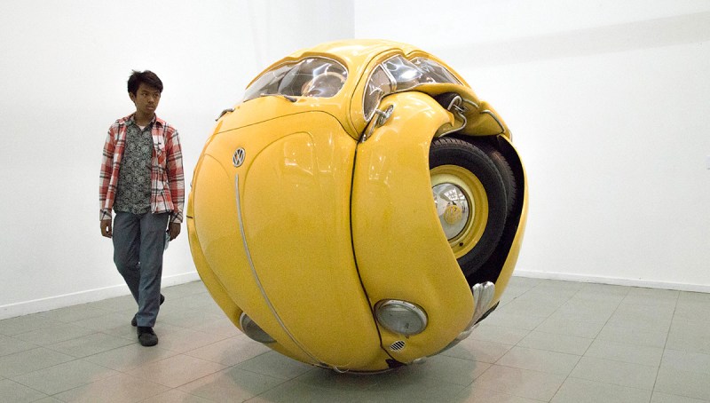 A student visitor looking at "beetle sphere" sculpture by sculptor Ichwan Noor. Indonesia National Gallery held it 2nd Sculptor exhibition from selected sculptor arround Indonesia called "Trienal Sculpture Art Exhibition" with theme "Versi" (version) based on two strong paradigm in Sculpture art : respecting the tradition on human craft and using experimental base on deep though and concept. The exhibition is the second time exhibition at the gallery. (Photo by Donal Husni/NurPhoto) (Photo by NurPhoto/NurPhoto via Getty Images)