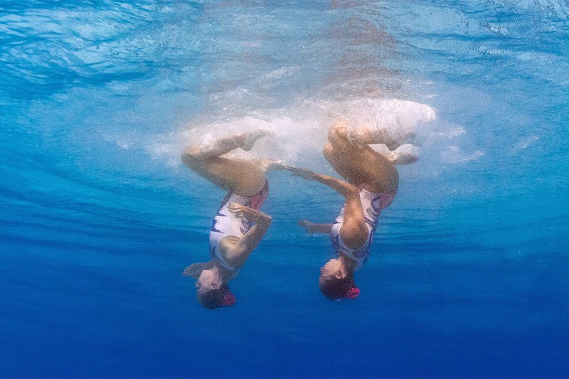 TOPSHOT - A picture taken with an underwater camera shows Israel's Ievgenia Tetelbaum and Israel's Anastasia Glushkov Leventhal competing in the Duets Technical Routine preliminaries during the synchronised swimming event at the Maria Lenk Aquatics at the Rio 2016 Olympic Games in Rio de Janeiro on August 15, 2016. / AFP / François-Xavier MARIT (Photo credit should read FRANCOIS-XAVIER MARIT/AFP/Getty Images)