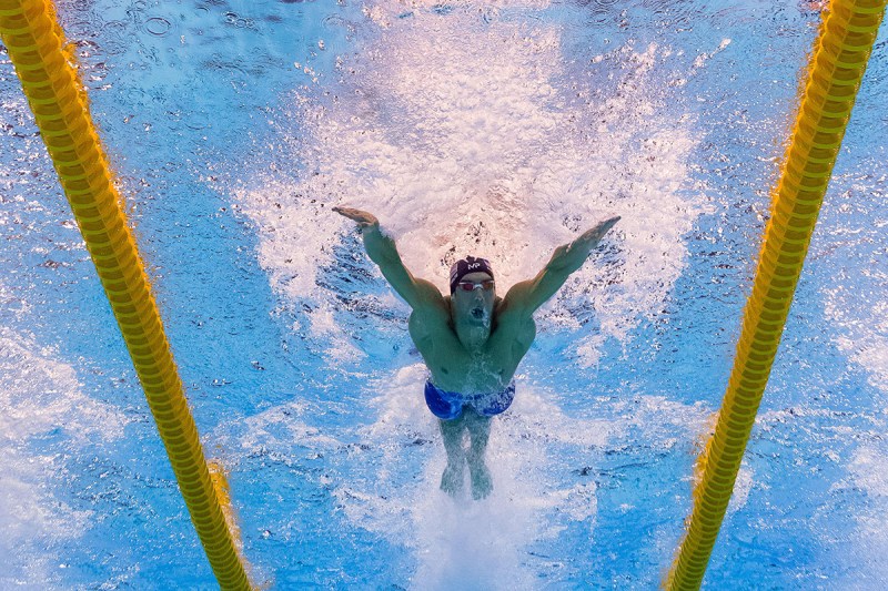 Underwater view shows USA's Michael Phelps taking part in the Men's 100m Butterfly Semifinal during the swimming event . (François-Xavier Marit/AFP/Getty Images)