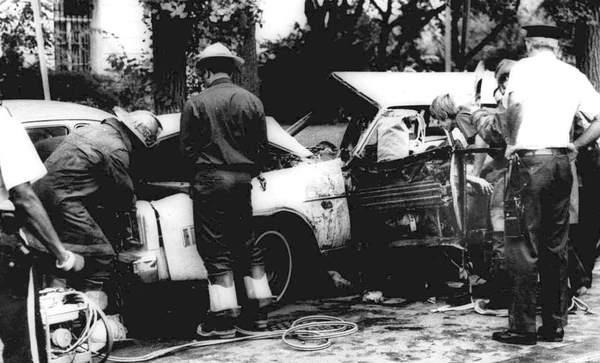 Firemen remove victims from a car shattered by a bomb blast on Embassy Row in Washington, D.C. Sept. 21, 1976. Orlando Letelier, former Chilean ambassador to the U.S., and Ronne Karpen Moffitt, his aide, were both killed in the blast. (AP Photo)