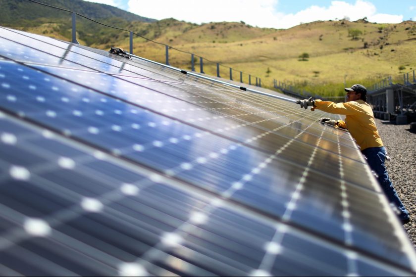 A worker cleans the panels in a solar power park run by the Costa Rican Electricity Institute (ICE) as the power company has managed to produce all of the electricity for the nation from renewable energy sources for more than 80 days straight on March 26, 2015 in Guanacaste, Costa Rica. The milestone has been reached with the use of hydroelectric power plants and a combination of wind, solar, and geothermal energy. (Joe Raedle/Getty Images)