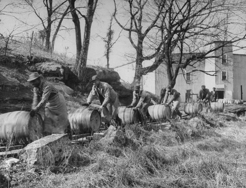 Barrels being rolled on wooden rails at Jack Daniels distillery. (Photo by Ed Clark/The LIFE Picture Collection/Getty Images)