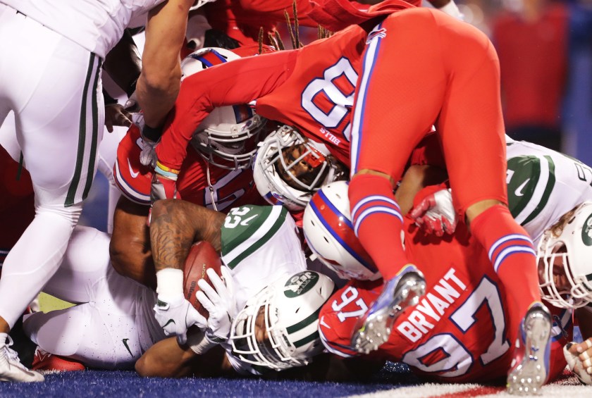 Matt Forte #22 of the New York Jets is stacked up at the goal line but is in for a touchdown against the Buffalo Bills during the second half at New Era Field on September 15, 2016 in Orchard Park, New York. (Brett Carlsen/Getty Images)