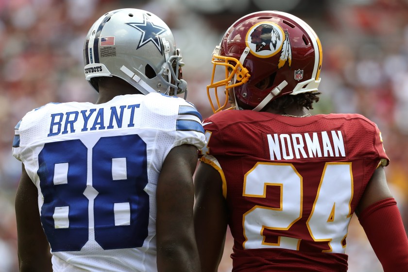 Wide receiver Dez Bryant #88 of the Dallas Cowboys argues with cornerback Josh Norman #24 of the Washington Redskins during the first quarter at FedExField on September 18, 2016 in Landover, Maryland. (Rob Carr/Getty Images)