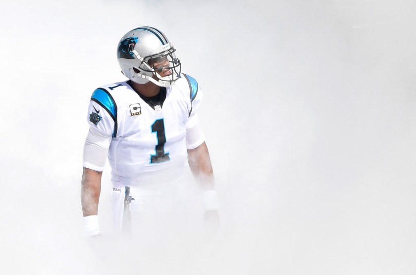 Cam Newton #1 of the Carolina Panthers emerges from the smoke before their game against the San Francisco 49ers at Bank of America Stadium on September 18, 2016 in Charlotte, North Carolina. (Grant Halverson/Getty Images)