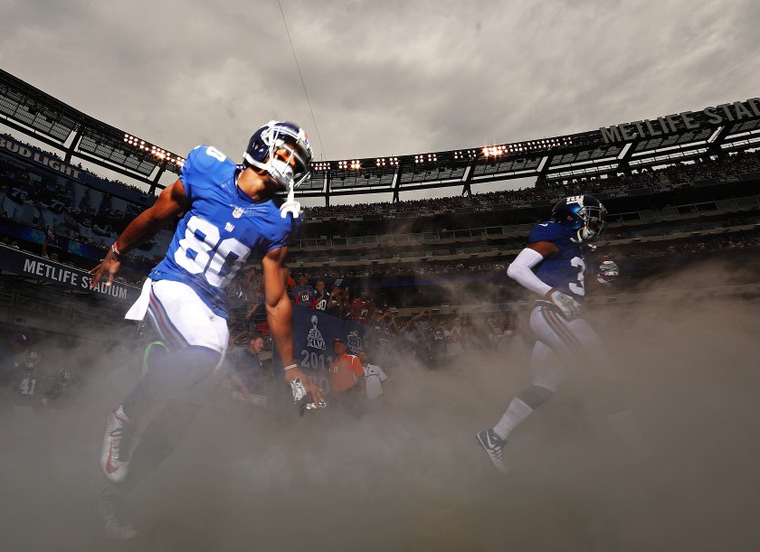 EAST RUTHERFORD, NJ - SEPTEMBER 18: Victor Cruz #80 of the New York Giants enters the field against the New Orleans Saints before their game at MetLife Stadium on September 18, 2016 in East Rutherford, New Jersey. (Photo by Al Bello/Getty Images)