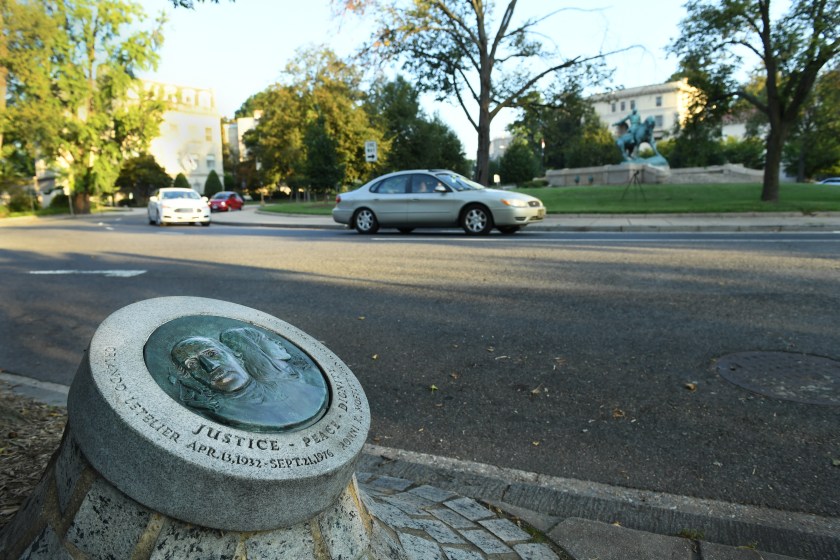 View of a memorial to Orlando Letelier and his colleague Ronni Moffitt who were killed at this very spot (in front of white building on Sheridan Circle) by a car bomb in 1976 in Washington, DC on August 27, 2016. (Linda Davidson / The Washington Post via Getty Images)