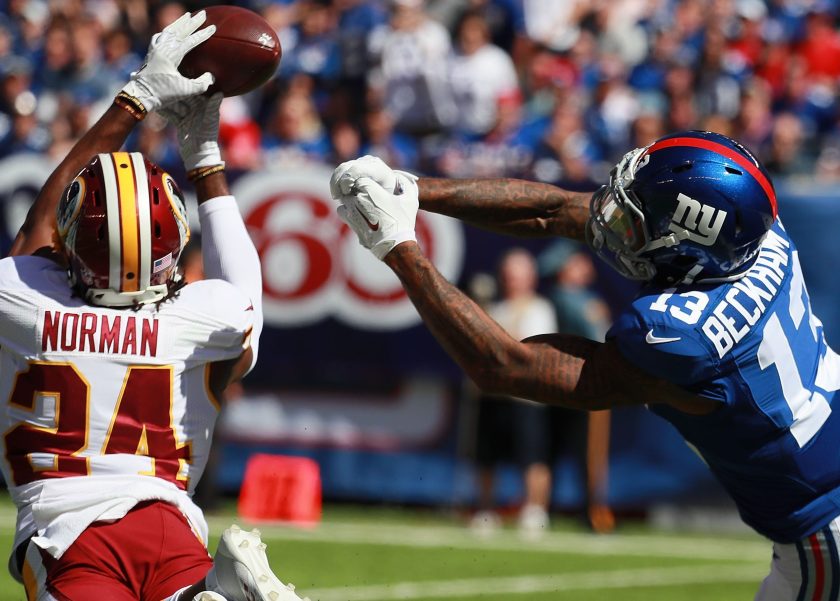 Josh Norman #24 of the Washington Redskins breaks up a pass to Odell Beckham #13 of the New York Giants at MetLife Stadium on September 25, 2016 in East Rutherford, New Jersey. (Michael Reaves/Getty Images)