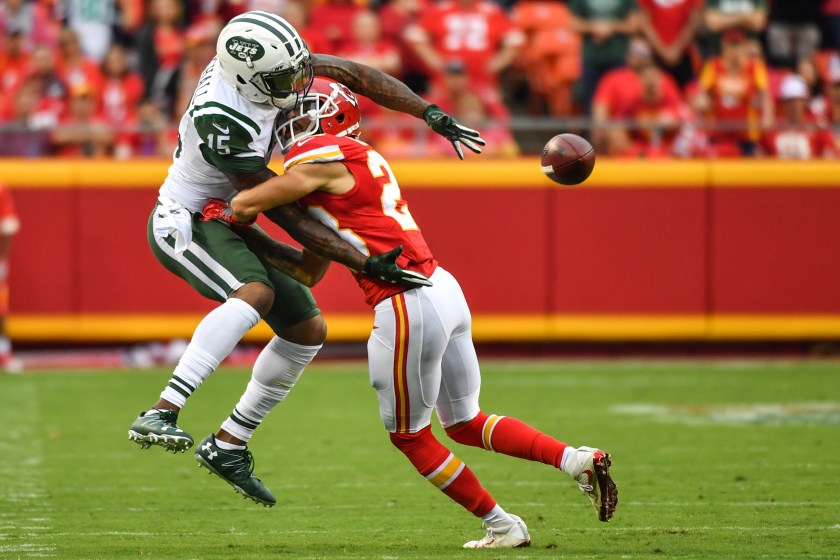 Wide receiver Brandon Marshall #15 of the New York Jets trys to make a catch through cornerback Phillip Gaines #23 of the Kansas City Chiefs at Arrowhead Stadium during the fourth quarter of the game on September 25, 2016 in Kansas City, Missouri. (Peter Aiken/Getty Images)