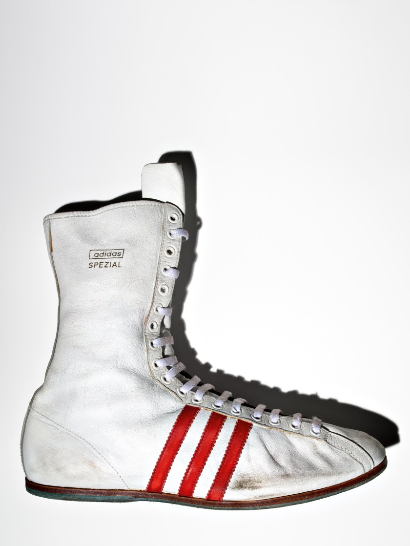 American boxer Muhammad Ali’s Adidas “Special” boxing shoe, size 13 US. Made with kangaroo leather uppers, Ali received these shoes when he defended his WBC title against Karl Mildenberger on October 9th, 1966 in Frankfurt, Germany. Banned from boxing in 1968 for refusing to fight in Vietnam, Ali sent back another shoe — signed and dedicated to Adi Dassler, the founder of Adidas — because he thought he wouldn’t need them anymore.(Henry Leutwyler) 