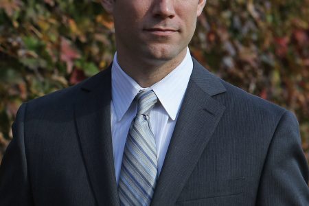 Theo Epstein, the new President of Baseball Operations for the Chicago Cubs, poses in the outfield following a press conference at Wrigley Field on October 25, 2011 in Chicago, Illinois. (Jonathan Daniel/Getty Images)