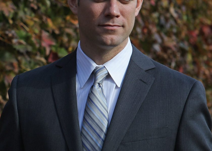 Theo Epstein, the new President of Baseball Operations for the Chicago Cubs, poses in the outfield following a press conference at Wrigley Field on October 25, 2011 in Chicago, Illinois. (Jonathan Daniel/Getty Images)