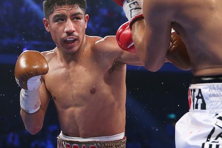 Jessie Vargas of the United States punches Antonio DeMarco of Mexico during the WBA world super lightweight title fight at The Venetian on November 23, 2014 in Macau, Macau.  (Chris Hyde/Getty Images)