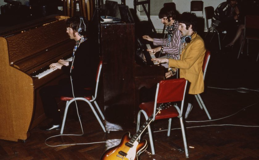 The Beatles play pianos at Abbey Road Studios, London, circa 1967. (Mark and Colleen Hayward/Getty Images)