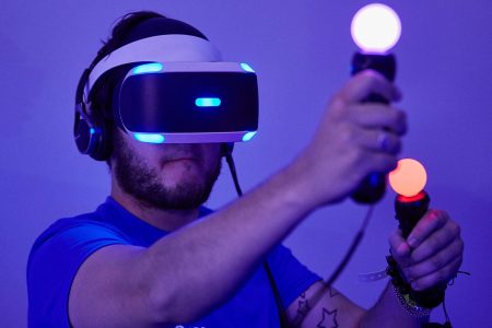  A gamer tests out Playstation VR (Virtual Reality) on the Sony PS4 on in Birmingham, England. The UK Gaming Industry contributed more than 1 billion to the UK's GDP in 2013 and estimates now put it's worth at  nearer 1.72 billion.  (M Bowles/Getty Images)