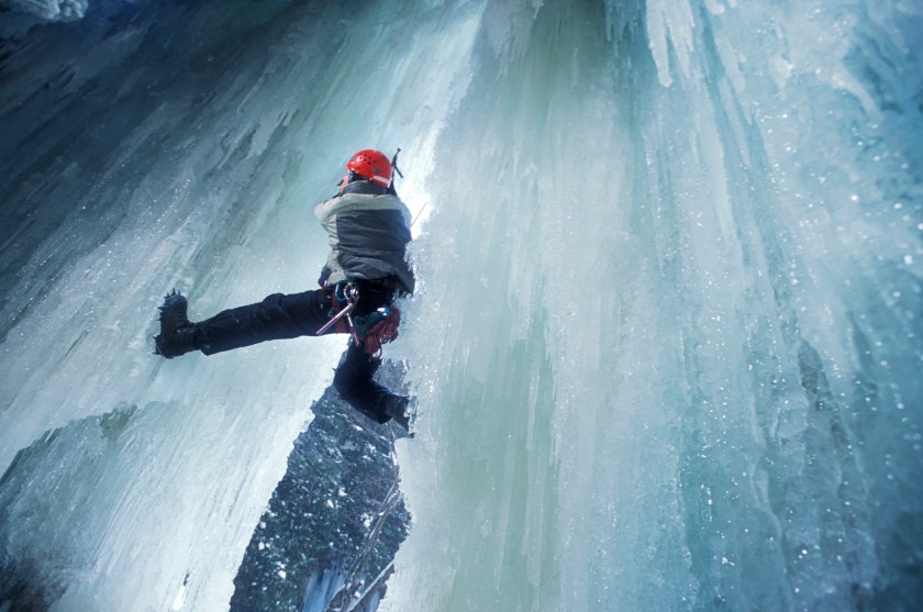 A man ice climbs a frozen waterfall in western Maryland. 2001. (Tim Tadder/Corbis via Getty Images)