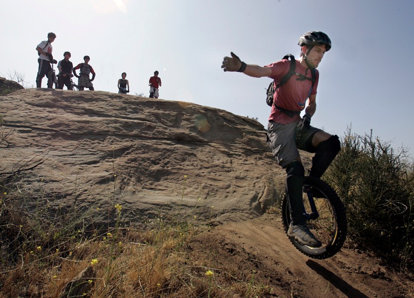 Mountain unicycling is growing and one of the preferred locations is Rocky Peak Nature Trails in Simi Valley. Eyal Aharoni, 28 of Santa Barbara, sets off down the trail at Rocky Peak. (Carlos Chavez/Los Angeles Times via Getty Images)