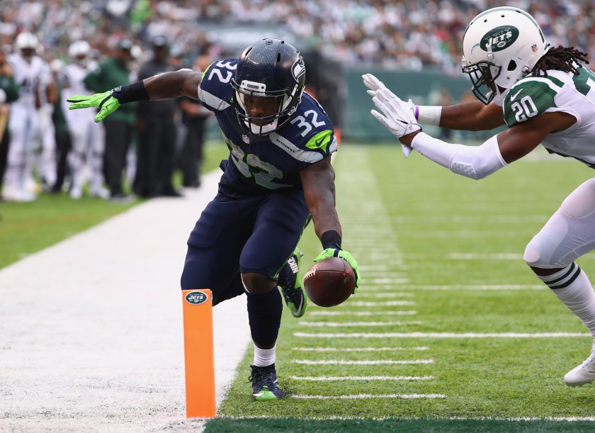 Christine Michael #32 of the Seattle Seahawks scores a touchdown against Marcus Williams #20 of the New York Jets in the fourth quarter at MetLife Stadium on October 2, 2016 in East Rutherford, New Jersey. (Photo by Al Bello/Getty Images)