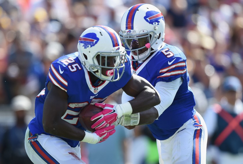 Quarterback Tyrod Taylor #5 of the Buffalo Bills hands off to teammate LeSean McCoy #25 during the second quarter of the game against the Los Angeles Rams at the Los Angeles Memorial Coliseum on October 9, 2016 in Los Angeles, California. (Harry How/Getty Images)