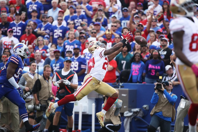 Shaun Draughn #24 of the San Francisco 49ers can't make the catch against the Buffalo BillBuffalo Billsduring the first half at New Era Field on October 16, 2016 in Buffalo, New York. (Tom Szczerbowski/Getty Images)