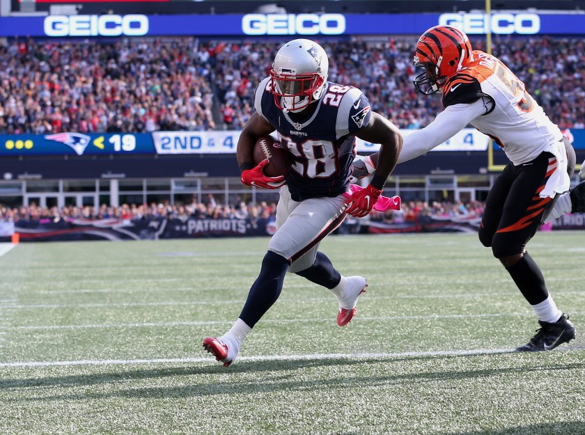 James White #28 of the New England Patriots runs in a touchdown against the Cincinnati Bengals in the third quater of the game at Gillette Stadium on October 16, 2016 in Foxboro, Massachusetts. (Jim Rogash/Getty Images)