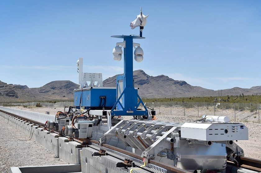 A recovery vehicle and a test sled sit on rails after the first test of the propulsion system at the Hyperloop One Test and Safety site on May 11, 2016 in North Las Vegas, Nevada. The company plans to create a fully operational hyperloop system by 2020. (David Becker/Getty Images)