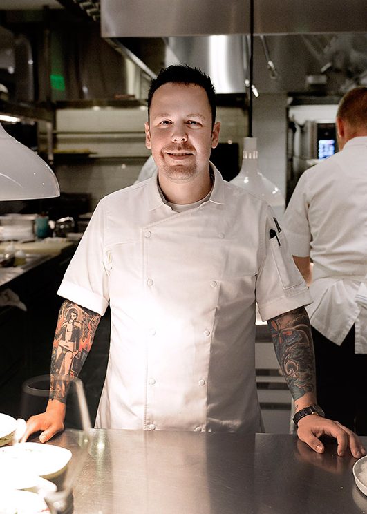 Chef Aaron Silverman, from Rose's Luxury and Pineapple And Pearls restaurants, poses inside Pineapple And Pearls' kitchen on September 21, 2016, in Washington, DC.  / AFP / Olivier Douliery        (Photo credit should read OLIVIER DOULIERY/AFP/Getty Images)