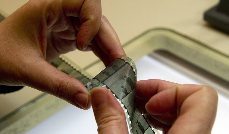 Film Preservation Specialist Barbara Whitehead looks over an old splice in the silent film "Little Brother" during the inspection phase at the Library of Congress Packard Campus for Audio Visual Conservation (Jim Watson/AFP/Getty Images)