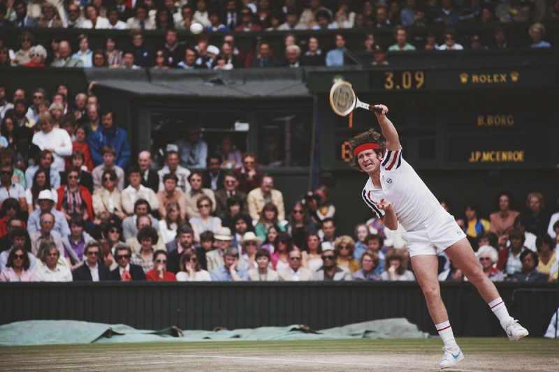 John McEnroe of the United States serves during the Men's Singles Final match against Bjorn Borg at the Wimbledon Lawn Tennis Championship on 6 July 1980 at the All England Lawn Tennis and Croquet Club in Wimbledon in London, England. (Photo by Steve Powell/Getty Images)