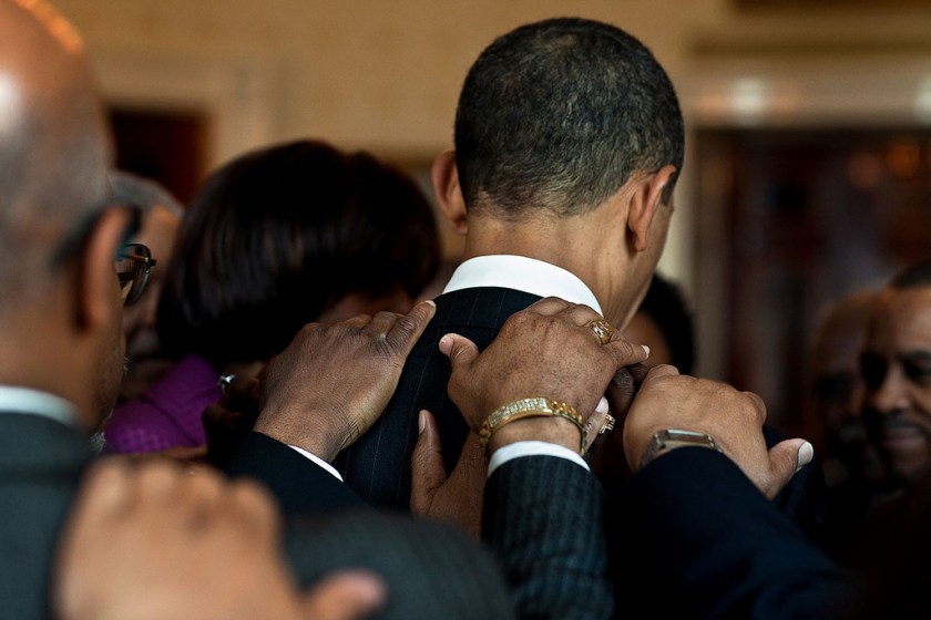 "Before a prayer breakfast, the President met privately with clergy members in the Blue Room at the White House. At the conclusion of the meeting, a final prayer was delivered as they held each other's shoulders." (Official White House Photo by Pete Souza)