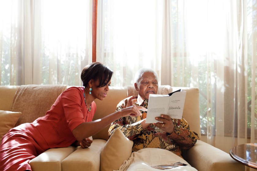 First Lady Michelle Obama meets with former President Nelson Mandela of South Africa at Mandela's home in Houghton, South Africa, June 21, 2011. (Official White House Photo by Samantha Appleton)