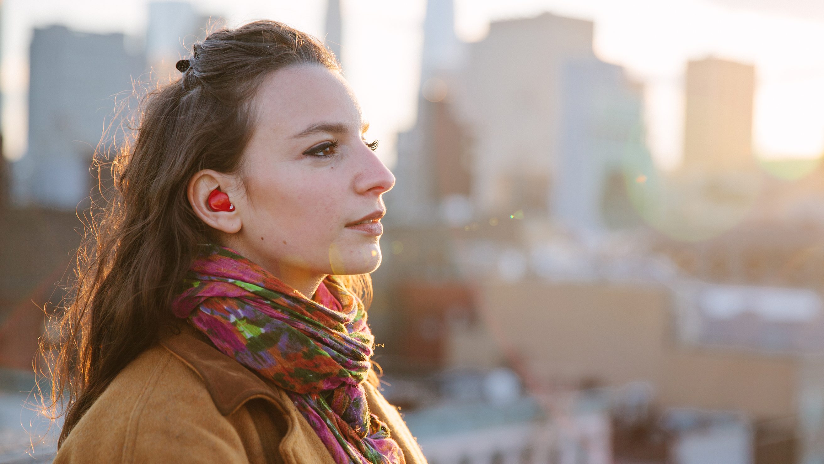 Pilot, the red stylish earbud, could be the world's first translating wearable device (Courtesy Waverly Labs)