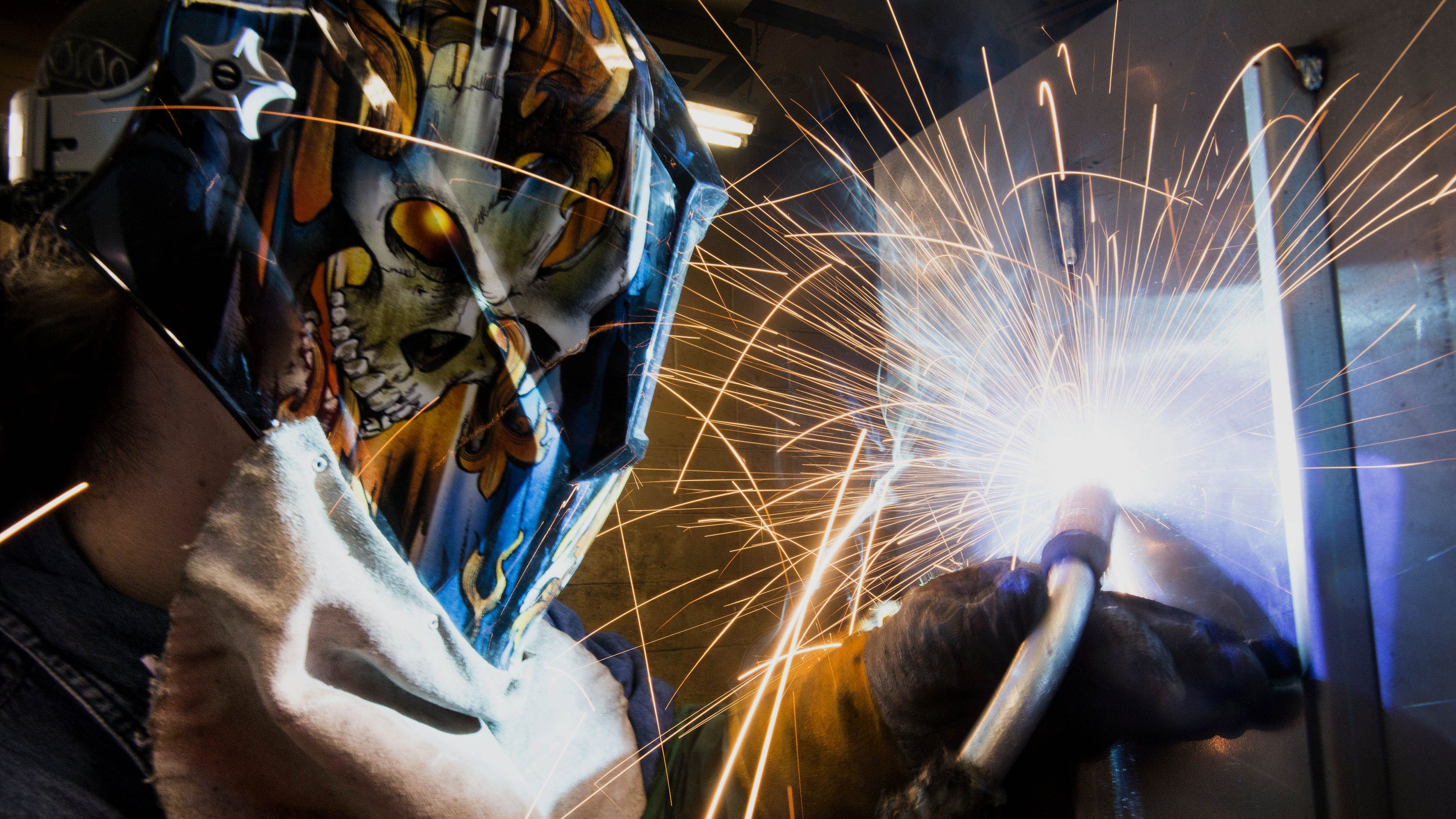 An employee uses a mig welder to create a welding beed on the inside seem of a Pioneer coal stove at the Leisure Line Stove Co. facility in Berwick, Pennsylvania, U.S., on Friday, Aug. 30, 2013. (Ty Wright/Bloomberg via Getty Images)