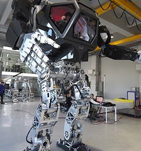 Engineers test a 13-foot-tall humanoid manned robot dubbed Method-2 in a lab of the Hankook Mirae Technology in Gunpo, south of Seoul, on December 27, 2016.
The giant human-like robot bears a striking resemblance to the military robots starring in the movie "Avatar" and is claimed as a world first by its creators from a South Korean robotic company.  (JUNG YEON-JE/AFP/Getty Images)