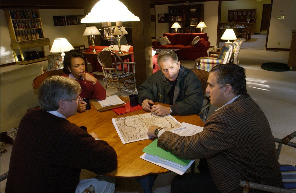 President George W. Bush receives a briefing during a meeting with CIA Director George Tenet, right, National Security Advisor Condoleezza Rice, and Chief of Staff Andy Card at Camp David, Saturday, 29 September 2001. (White House/Eric Draper)