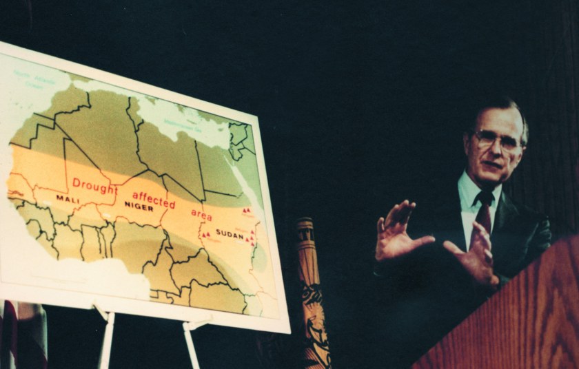 Vice President George H.W. Bush speaks while in front of a CIA map illustrating the drought in Africa in 1985. (Central Intelligence Agency)