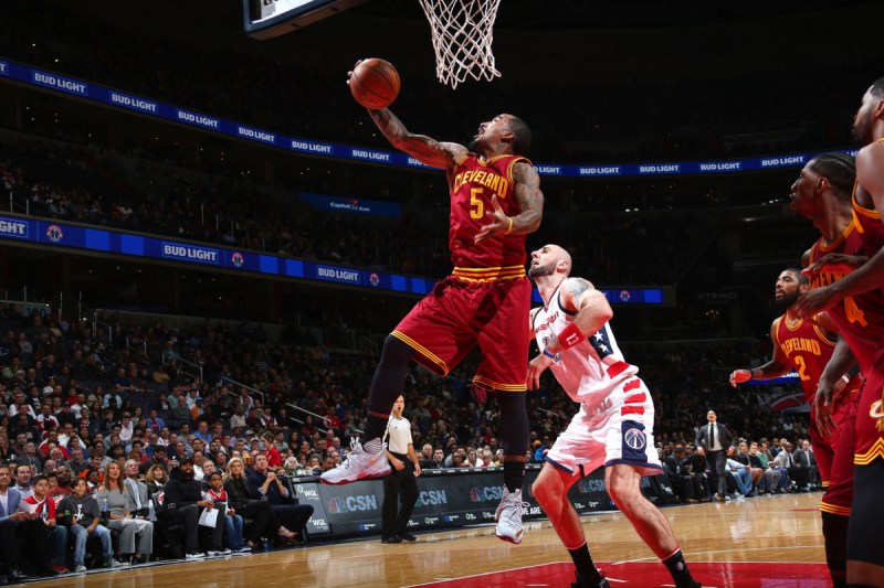 J.R. Smith #5 of the Cleveland Cavaliers goes for the rebound during the game against the Washington Wizards (Ned Dishman/NBAE via Getty Images)