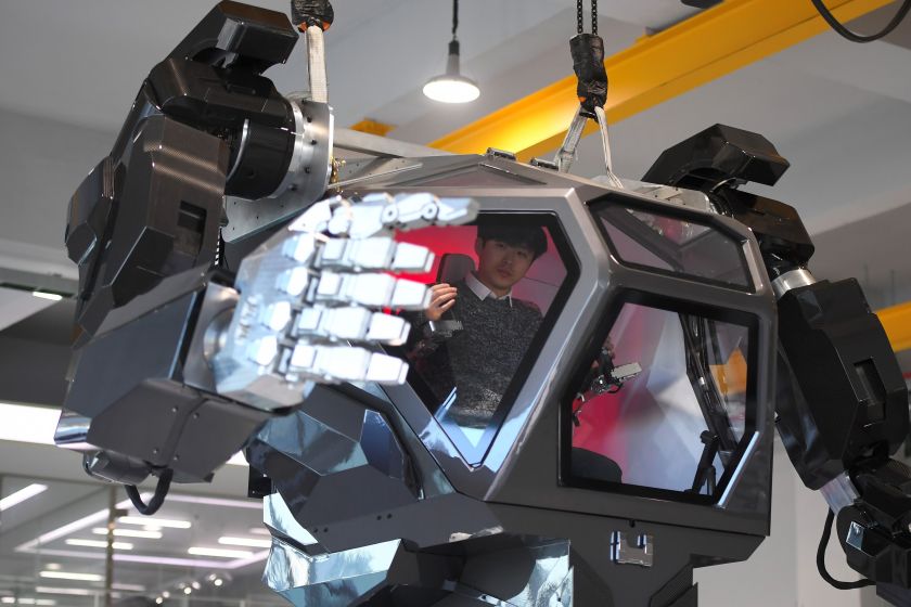 Engineers test a four-metre-tall humanoid manned robot dubbed Method-2 in a lab of the Hankook Mirae Technology in Gunpo, south of Seoul, on December 27, 2016. The giant human-like robot bears a striking resemblance to the military robots starring in the movie "Avatar" and is claimed as a world first by its creators from a South Korean robotic company. / AFP / JUNG Yeon-Je (Photo credit should read JUNG YEON-JE/AFP/Getty Images)