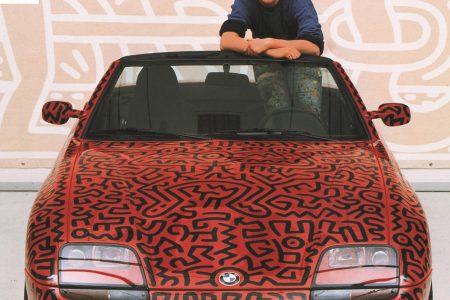 Haring posing with the 1991 BMW Z1 (Keith Haring Foundation/Petersen Automotive Museum)