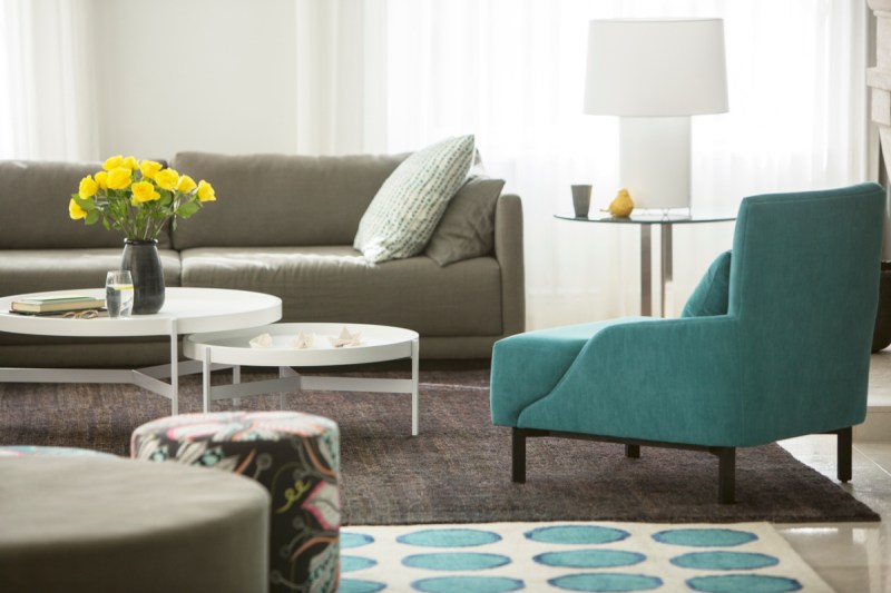 Home showcase living room with rose bouquet (Hoxton/Tom Merton)