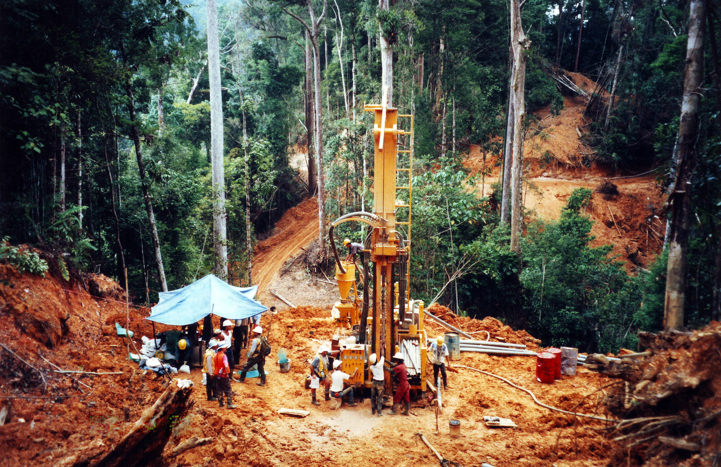 A drilling rig extracting drillcore to evaluate the economics of developing a potential gold mine deep in the Borneo jungle of Indonesia. (Getty Images)